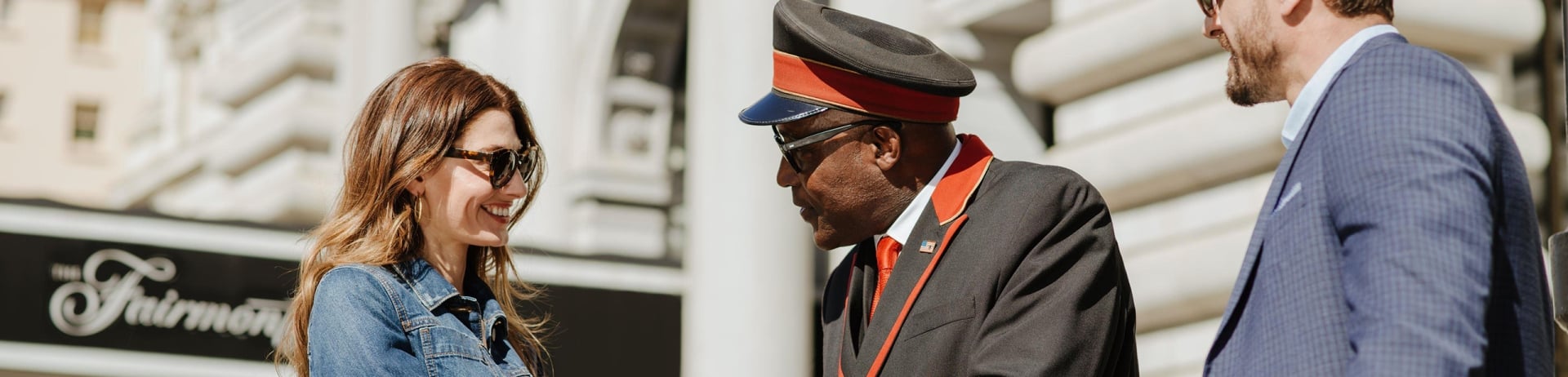 a couple speaking to the valet