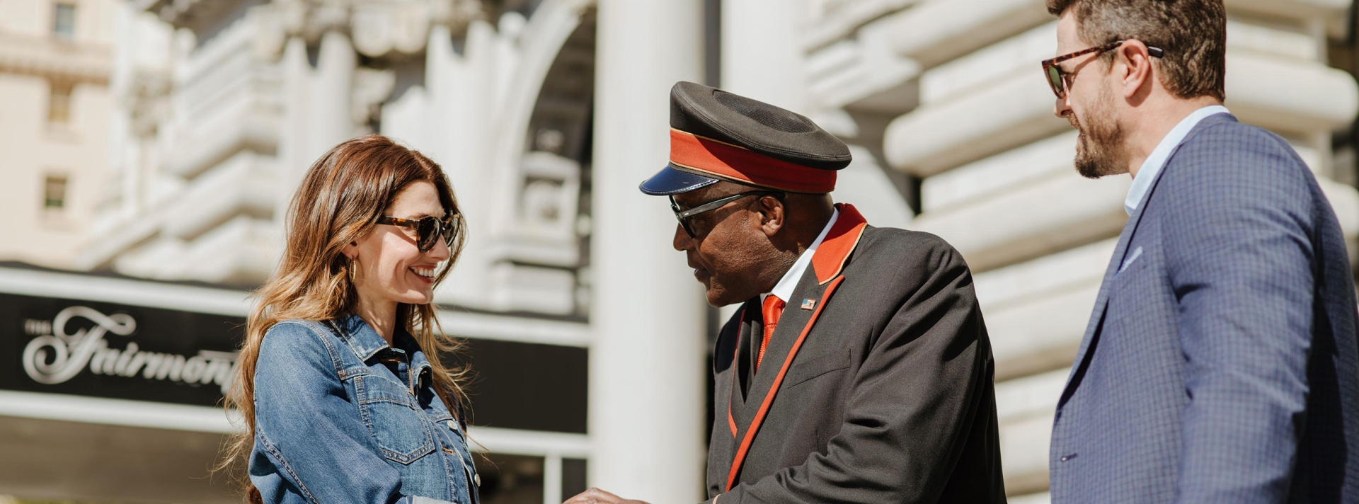 a couple speaking to the valet
