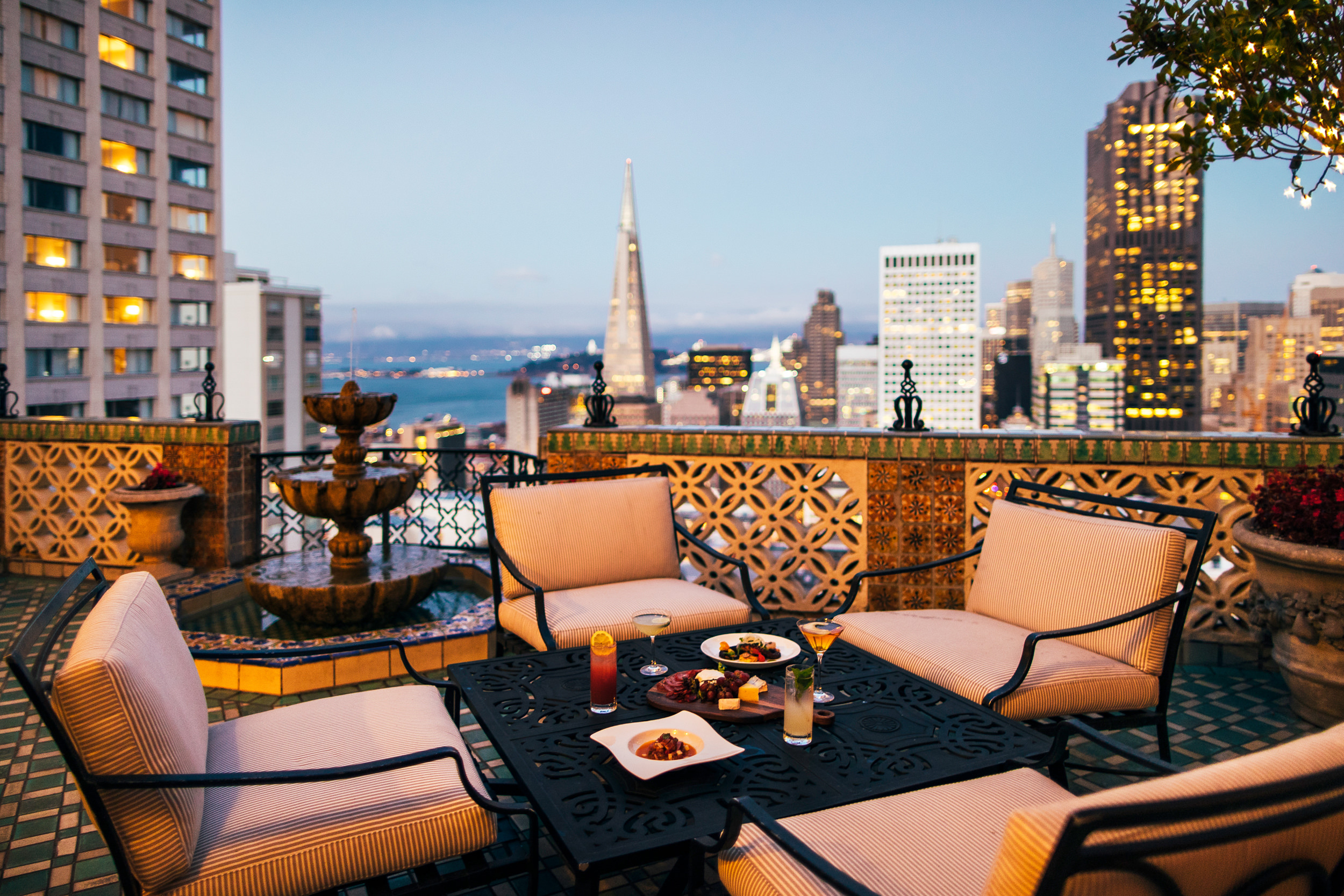 Cocktails and fruit were set on the balcony table