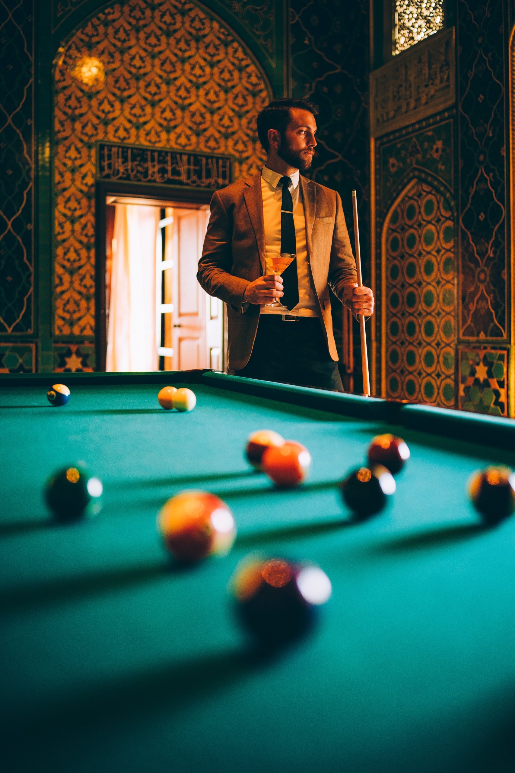 man playing pool