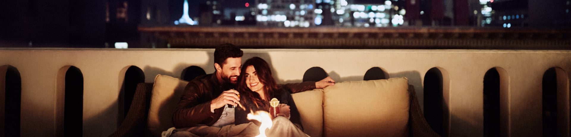 Couple by the fireplace