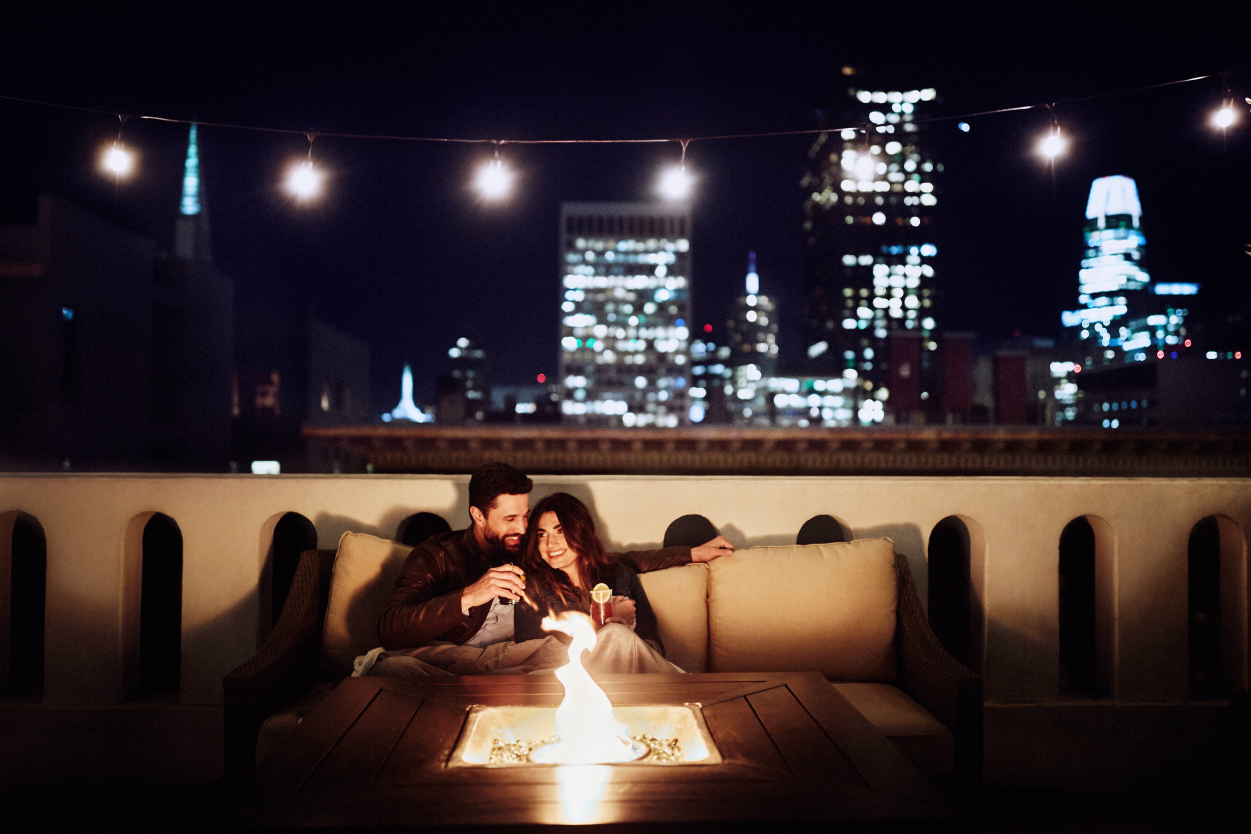 Couple by the fireplace