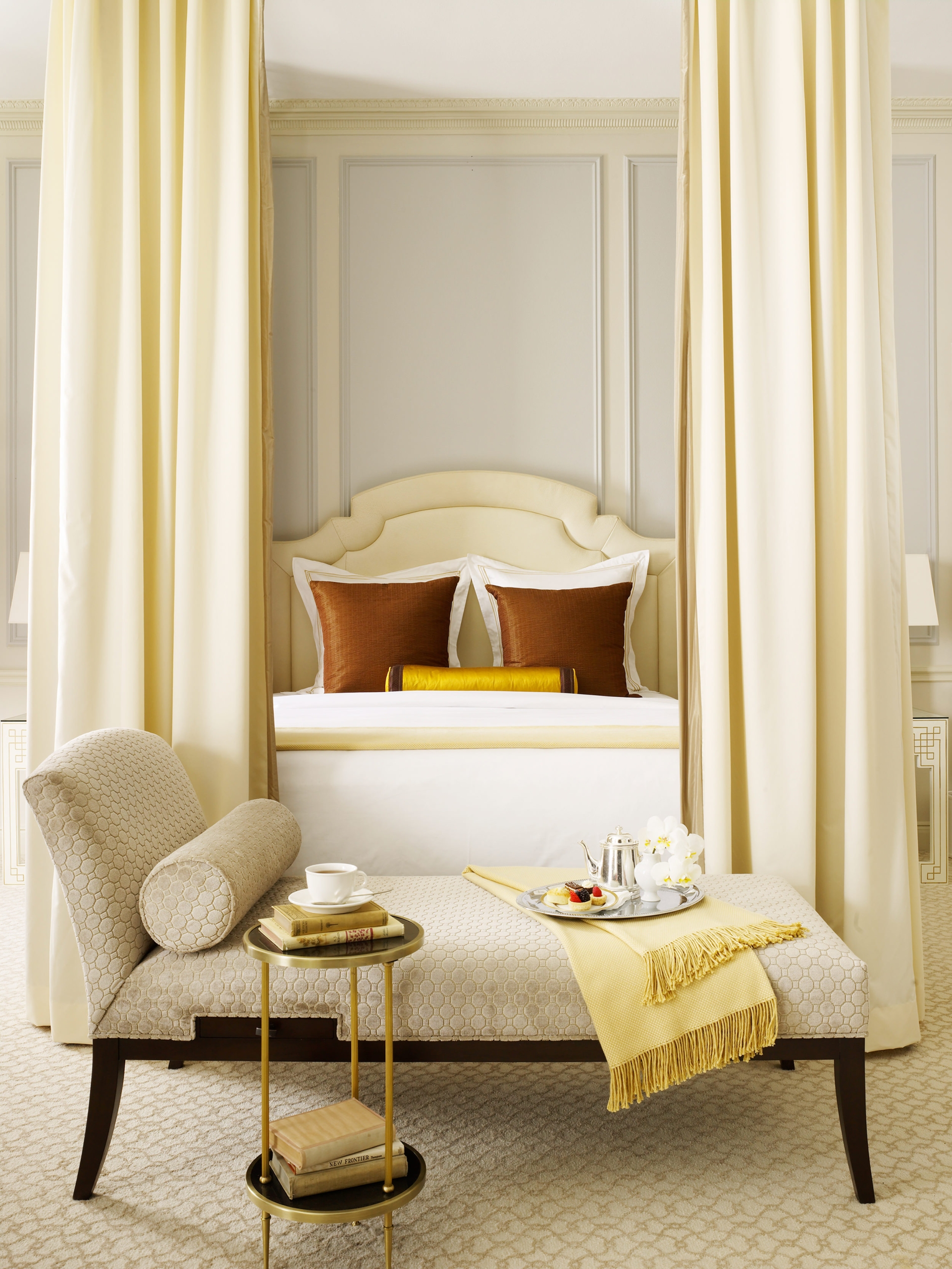 There was a pot of tea and dessert on the lounge chair