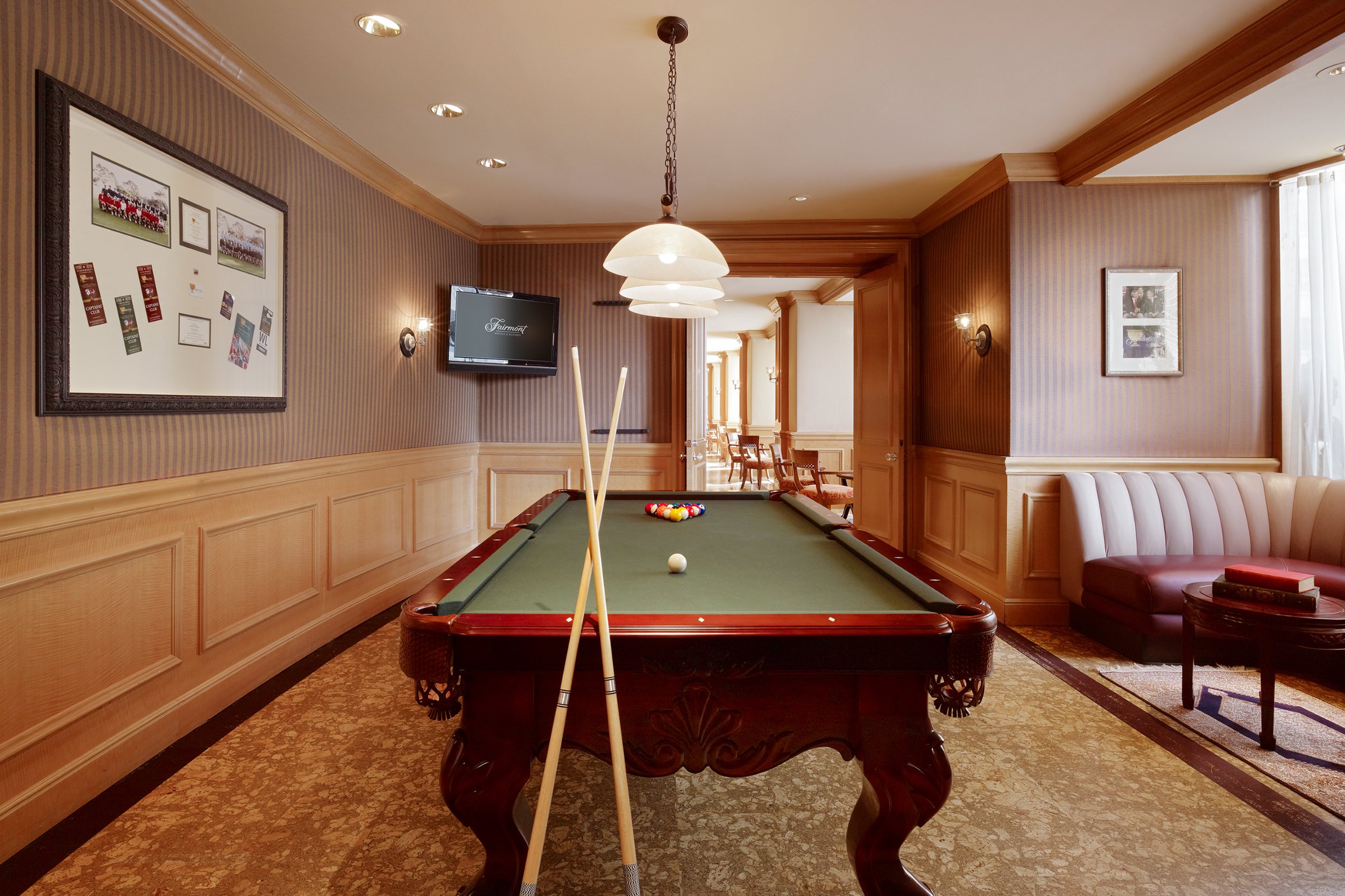 There is a Billiard table in the brown room