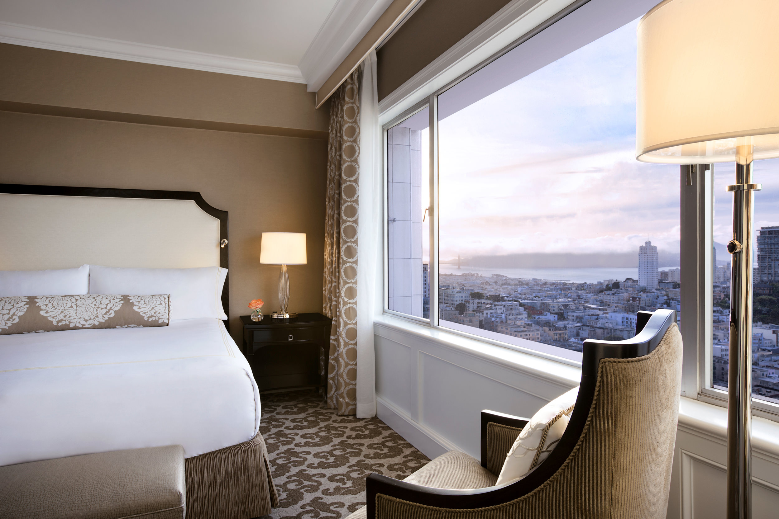 The window next to the bed has city views