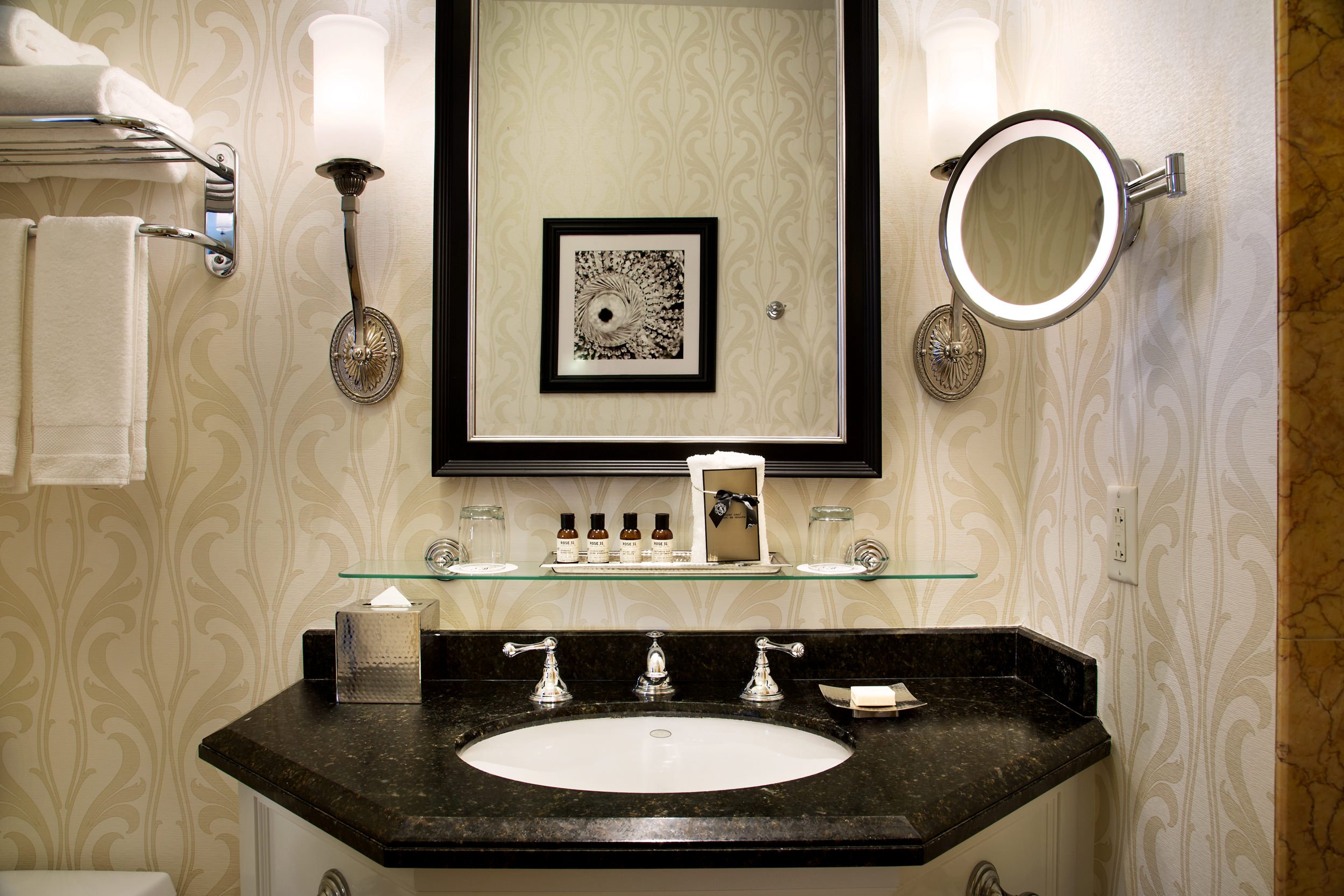 A black top is used to arrange toiletries