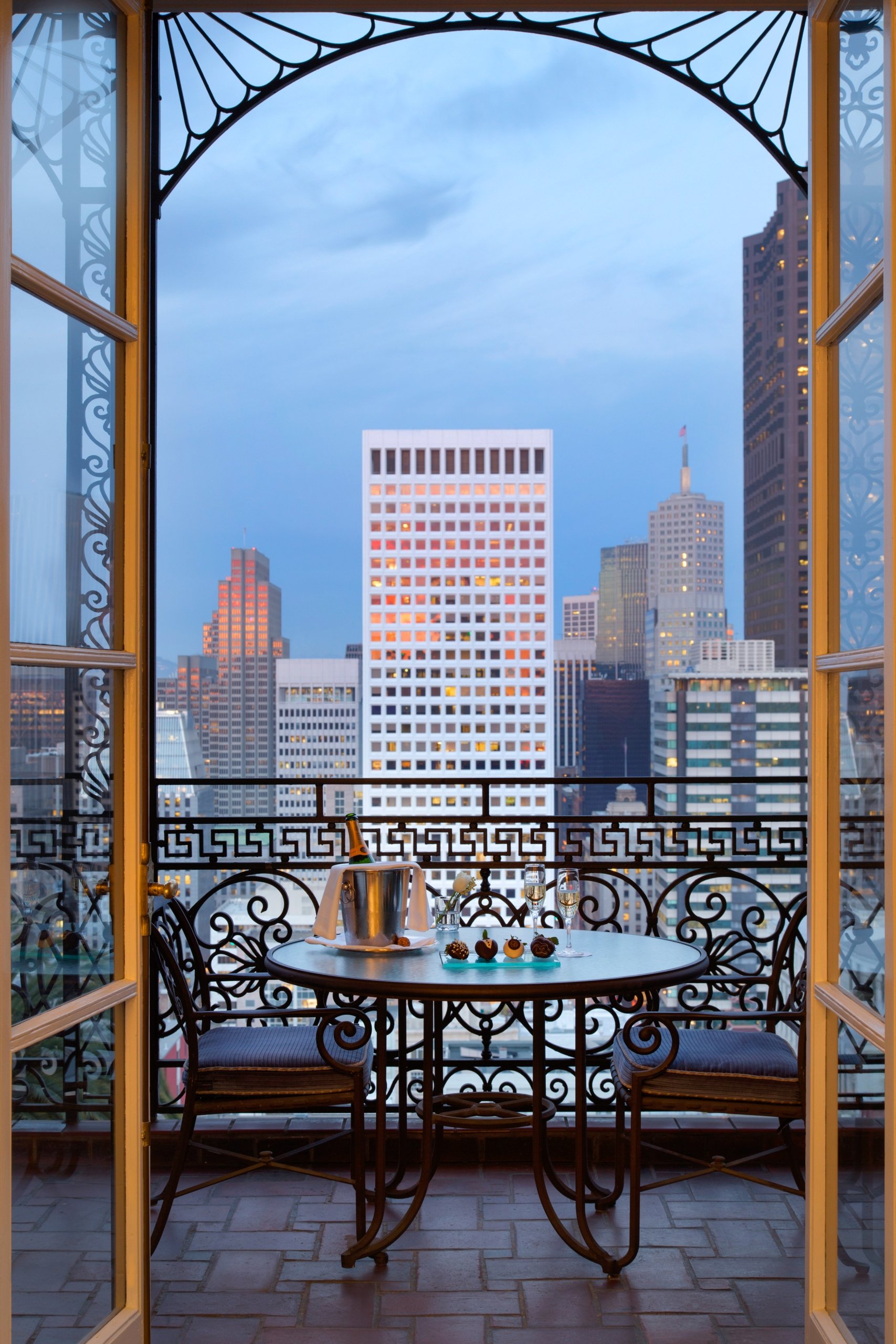 Champagne and dessert were set on a round table on the balcony