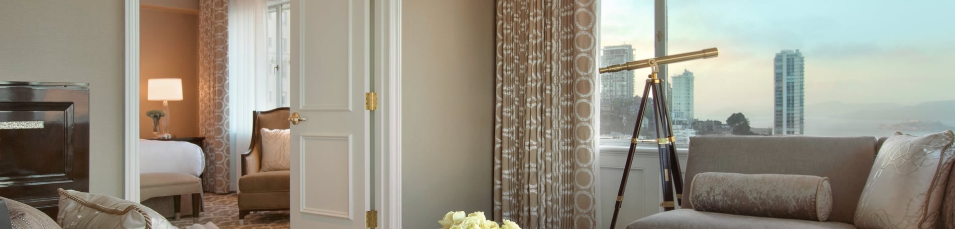 Honey lemon tea and flowers are placed on the coffee table in the living room