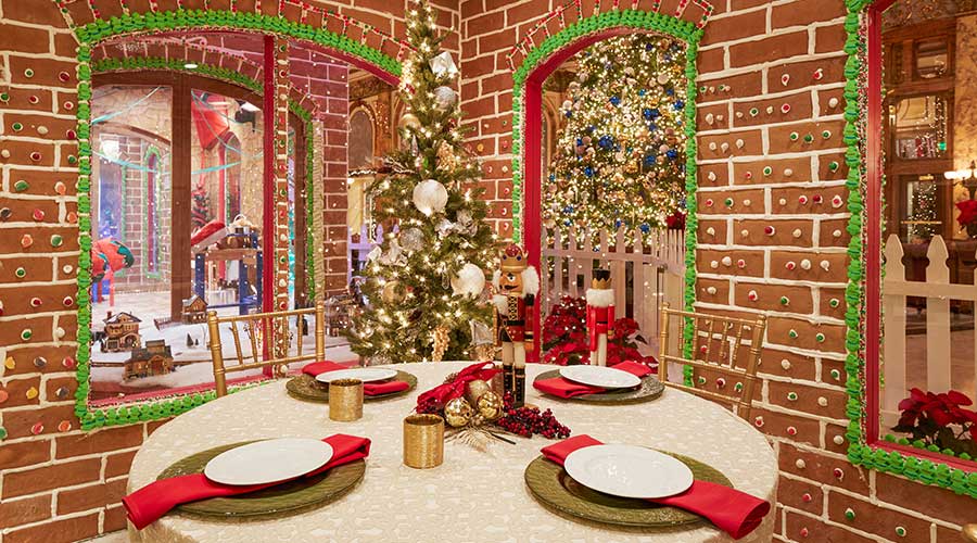table inside of large gingerbread house