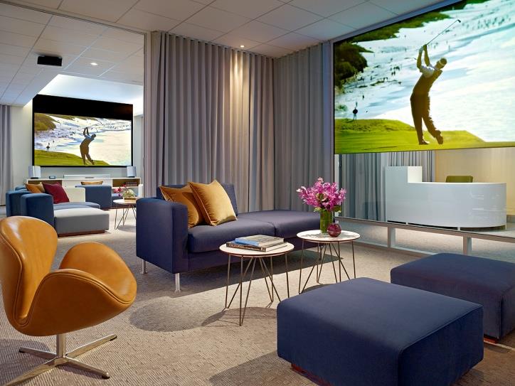 lounge with sitting areas and large tvs