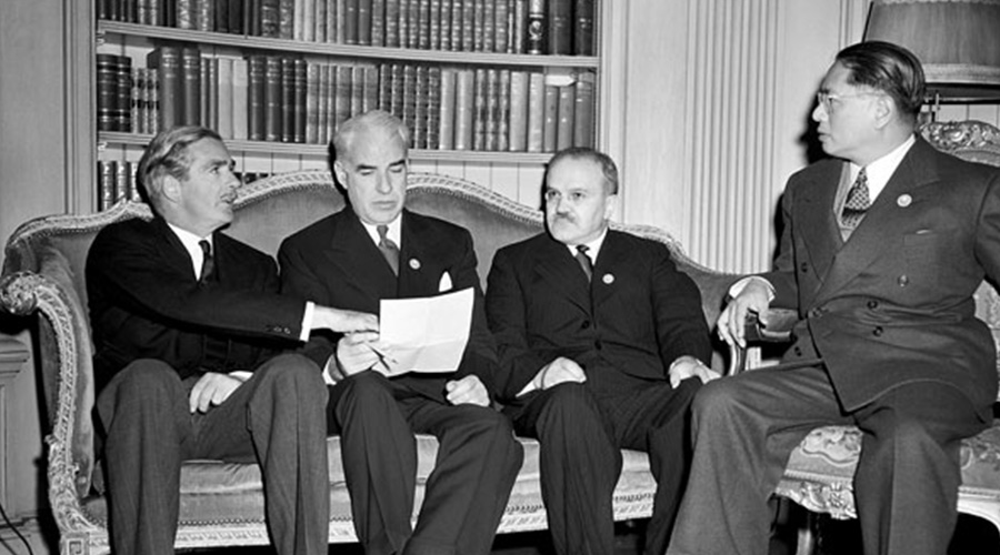 historic photo of a group of men meeting